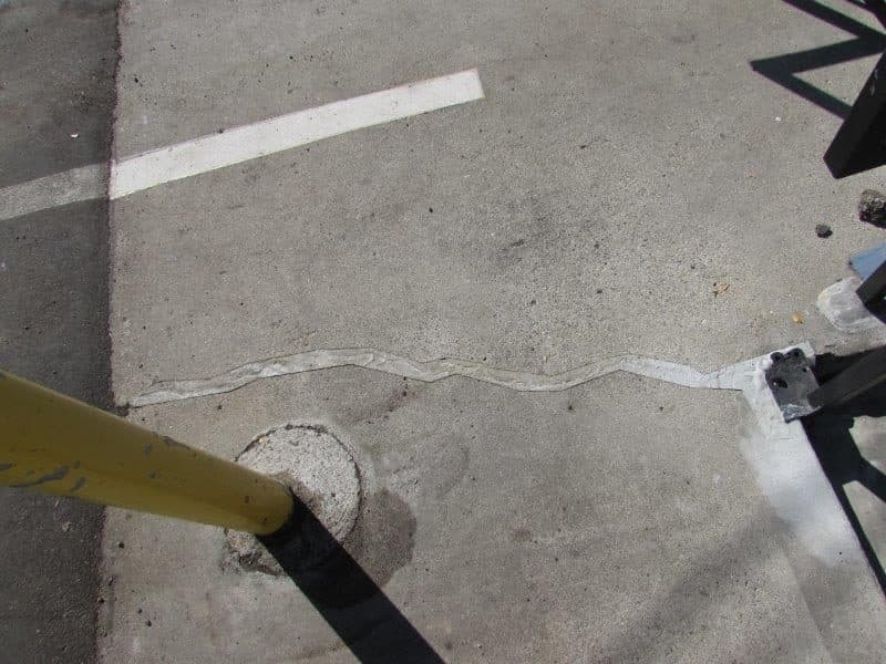 Filled concrete crack after repair